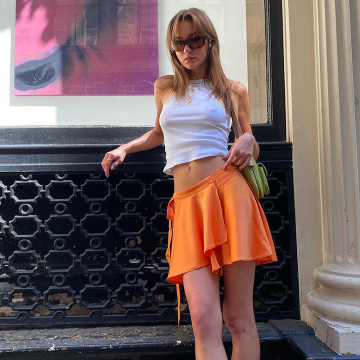 Dame trendiga wrap skirts med asymmetrisk fåll Mirla-Eva Jonsson