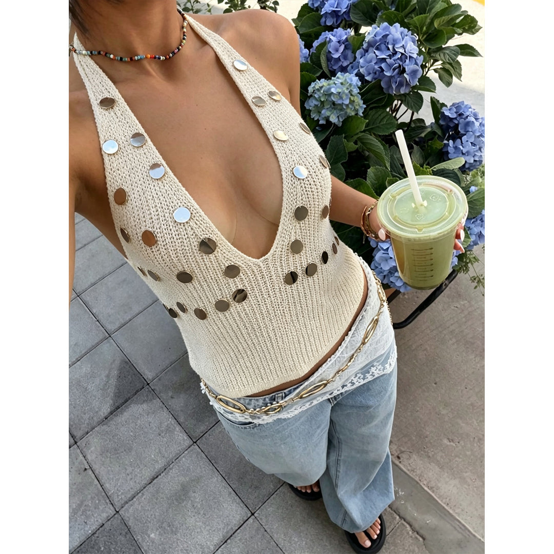 Dame trendy stickad topp med djup V-ringning och modiga metallic detaljer Mirla-Eva Jonsson