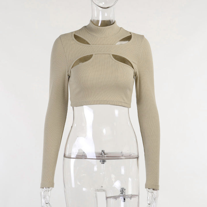 Dame trendy top med cut-outs och hög krage Mirla-Eva Jonsson
