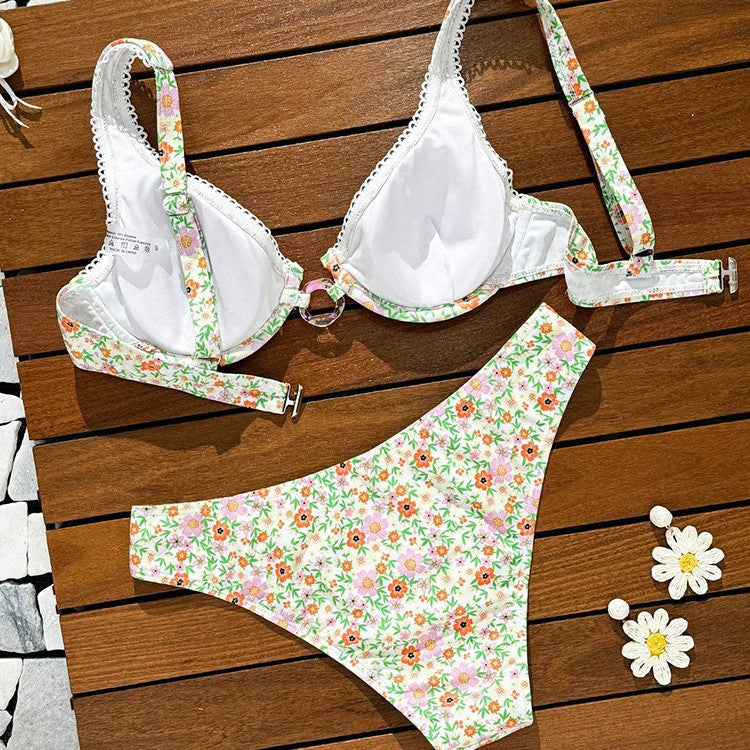 Dame triangel-bikini med genomskinliga remmar och lekfullt blommönster Mirla-Eva Jonsson