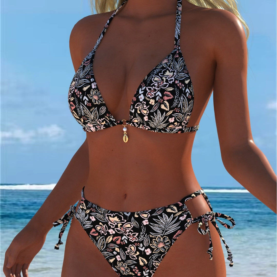 Dame triangel-bikini med lekfullt blommönster och justerbara knytband Mirla-Eva Jonsson
