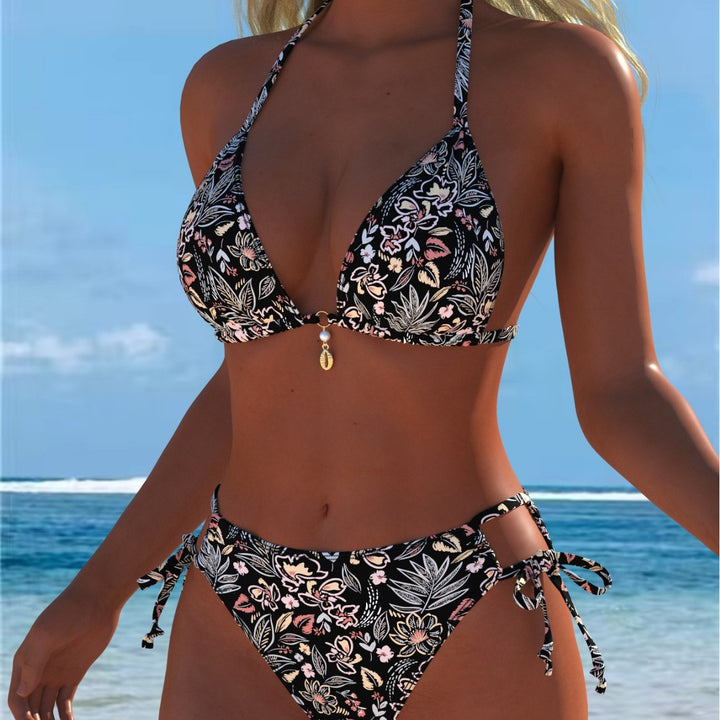 Dame triangel-bikini med lekfullt blommönster och justerbara knytband Mirla-Eva Jonsson
