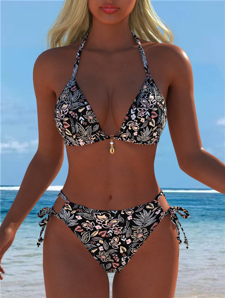 Dame triangel-bikini med lekfullt blommönster och justerbara knytband Mirla-Eva Jonsson