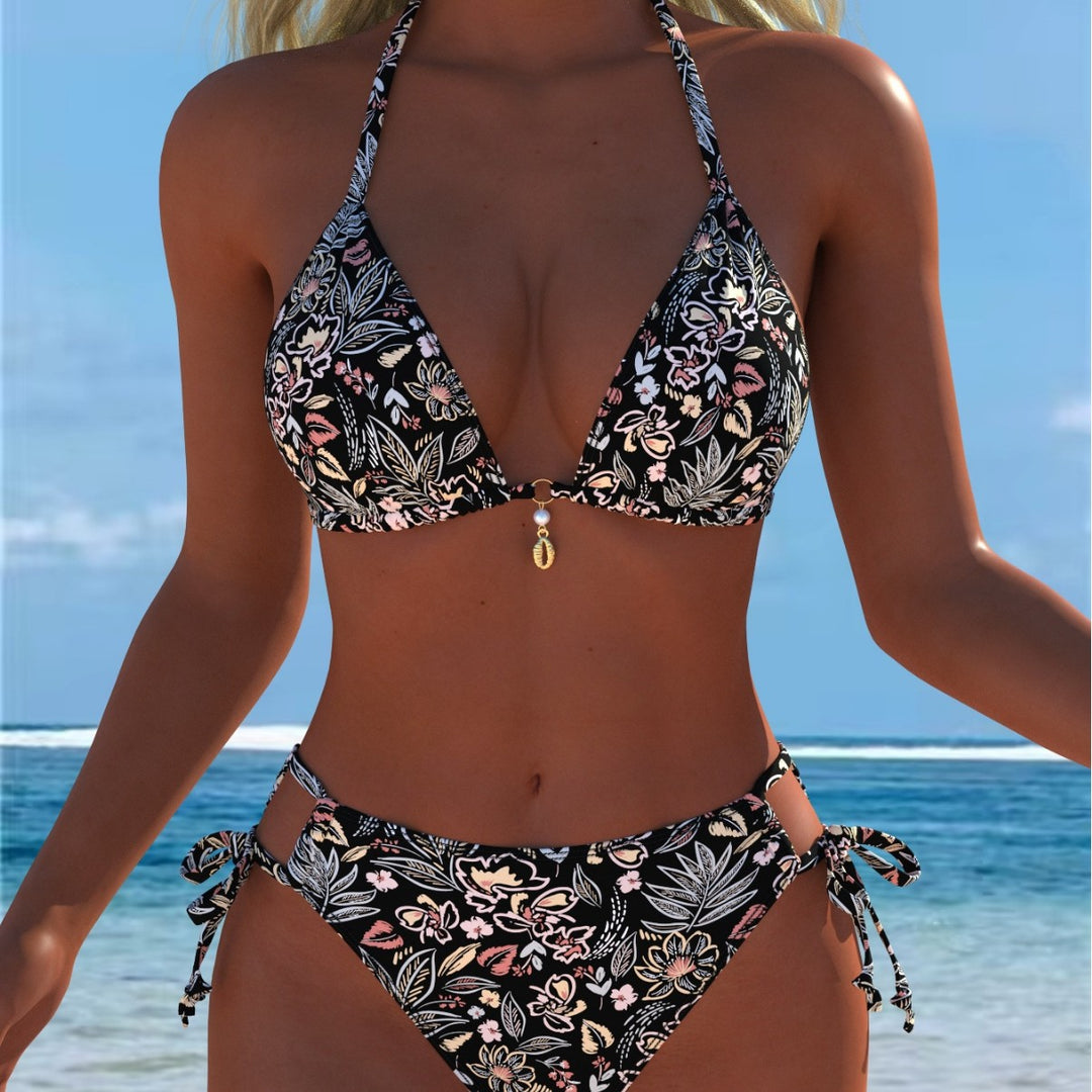 Dame triangel-bikini med lekfullt blommönster och justerbara knytband Mirla-Eva Jonsson