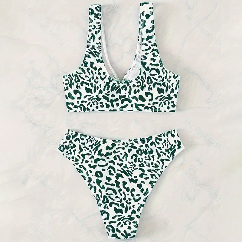 Dame triangel-bikini med moderiktigt ringdetalj och asymmetrisk skärning Mirla-Eva Jonsson