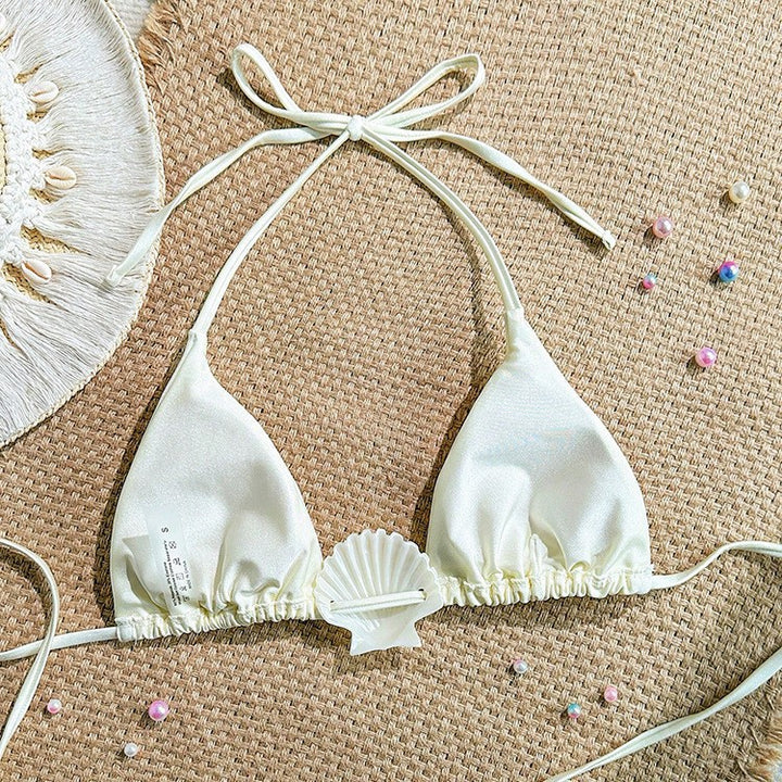 Dame triangelbikini med dekorativ snäcka Mirla-Eva Jonsson