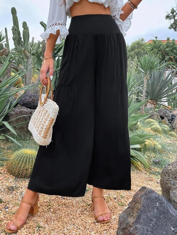 Dame vid culotte-byxor med eleganta volanger och hög midja Mirla-Eva Jonsson