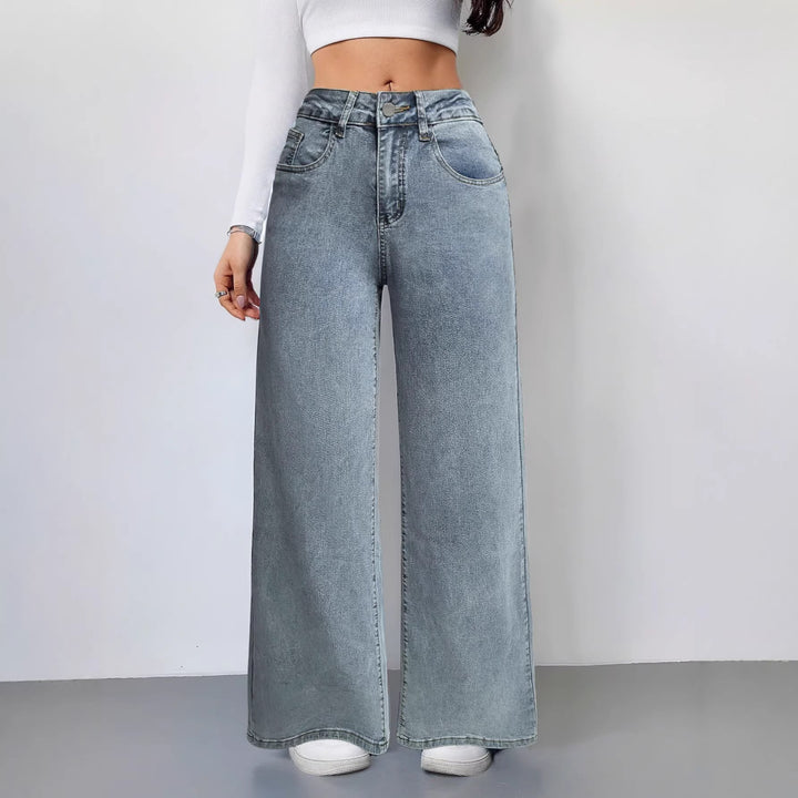 Dame vid-snitt vintage-stil jeans med hög midja och avslappnad look Mirla-Eva Jonsson