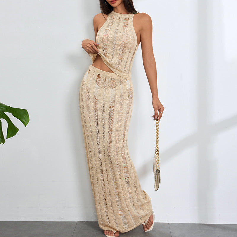 Dame virkad maxi klänning med djupa cut-outs och elegant design Mirla-Eva Jonsson