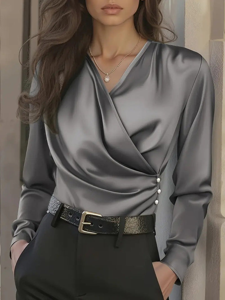 Dame wrap blouse with elegant button details Mirla-Eva Jonsson