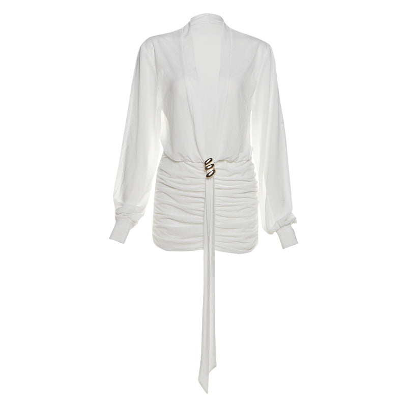 Dame wrap blouse with elegant gathering and colorful brooch closure Mirla-Eva Jonsson