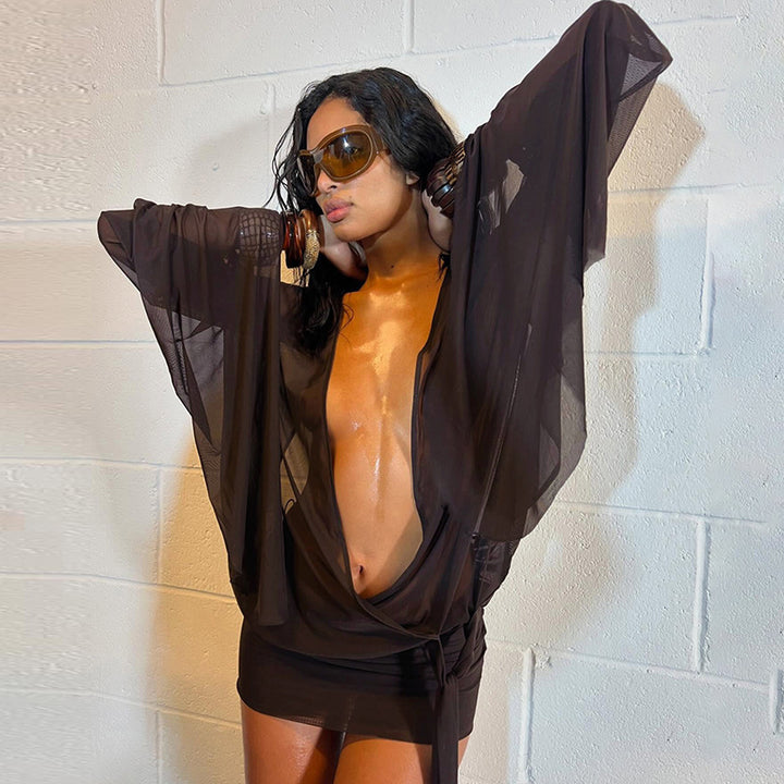 Dame wrap blouse with transparent sleeves and figure-hugging design Mirla-Eva Jonsson