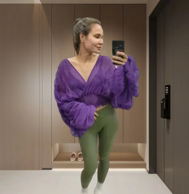 Dame wrap-blus med voluminösa ärmar och elegant design Mirla-Eva Jonsson