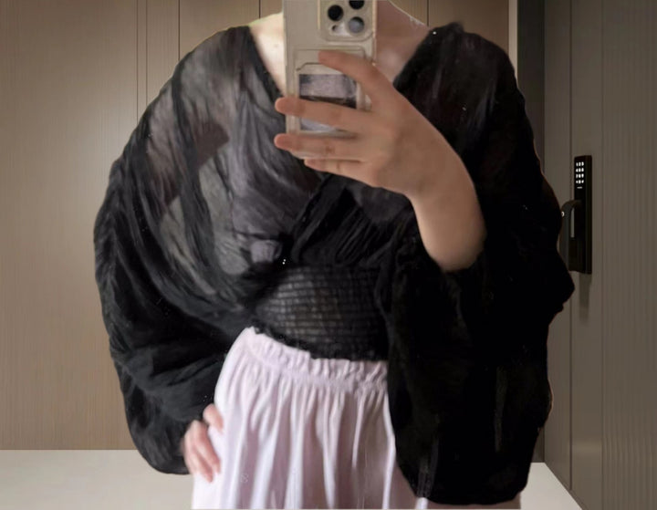 Dame wrap-blus med voluminösa ärmar och elegant design Mirla-Eva Jonsson