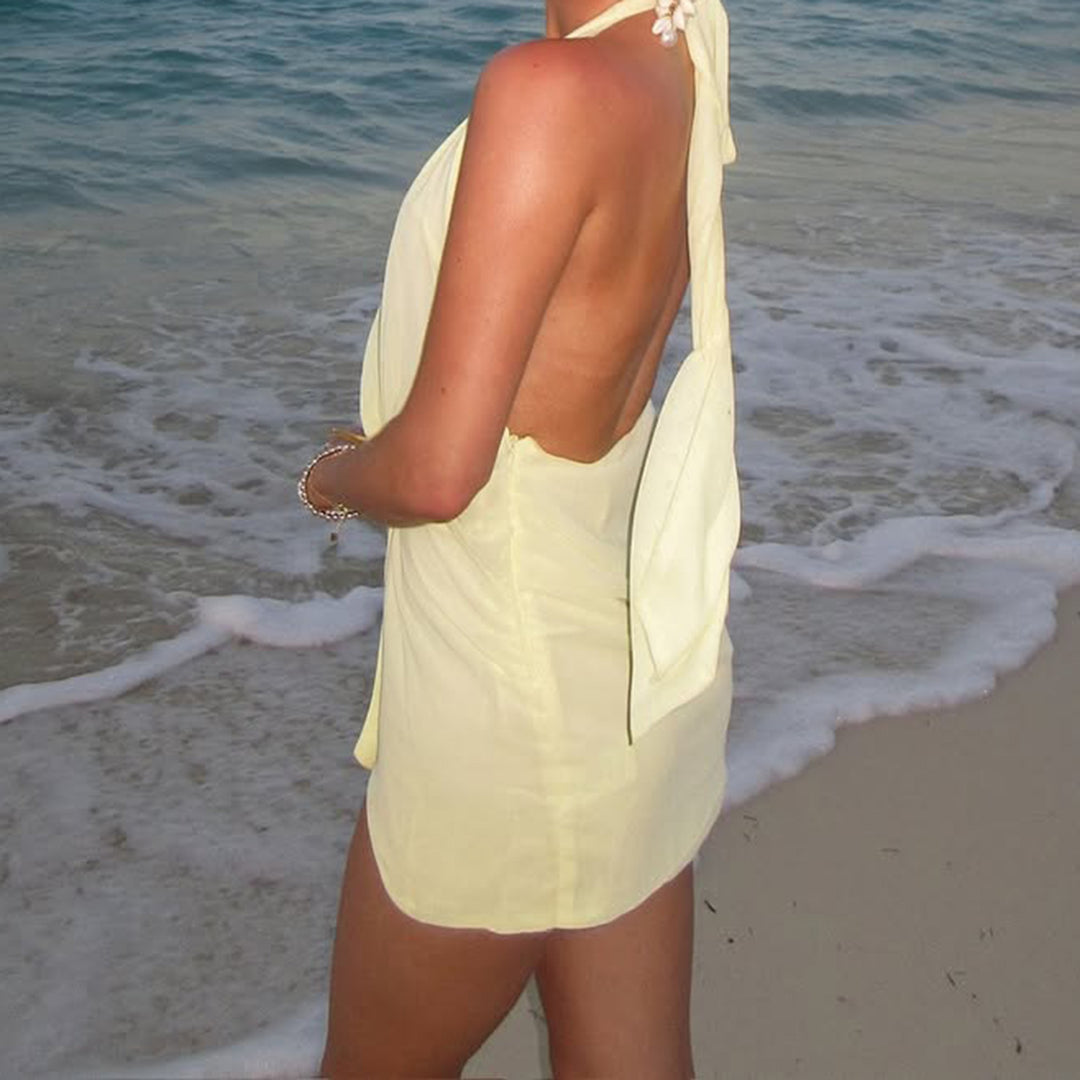 Dame wrap dress with deep neckline and decorative wash pocket Mirla-Eva Jonsson