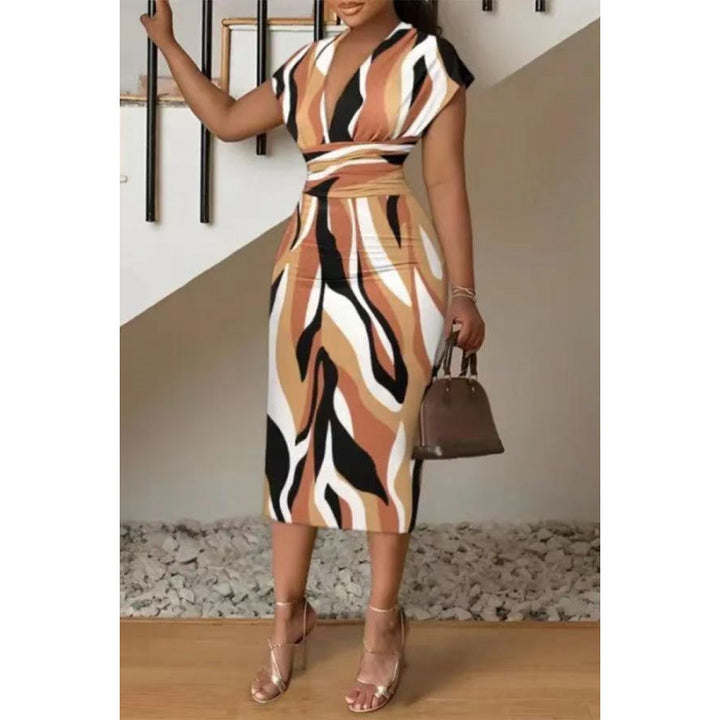 Dame wrap dress with modern pattern and figure-hugging silhouette Mirla-Eva Jonsson