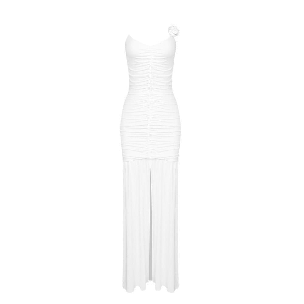 Dame wrap dress with sophisticated pleats and playful floral details Mirla-Eva Jonsson