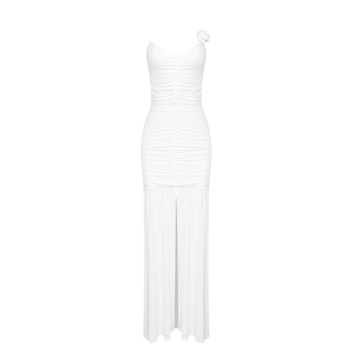 Dame wrap dress with sophisticated pleats and playful floral details Mirla-Eva Jonsson