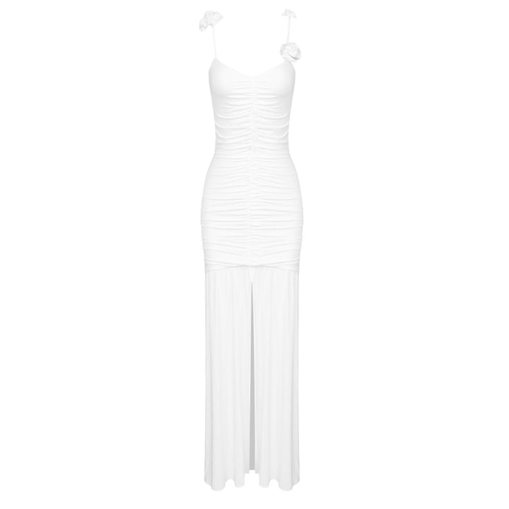 Dame wrap dress with sophisticated pleats and playful floral details Mirla-Eva Jonsson