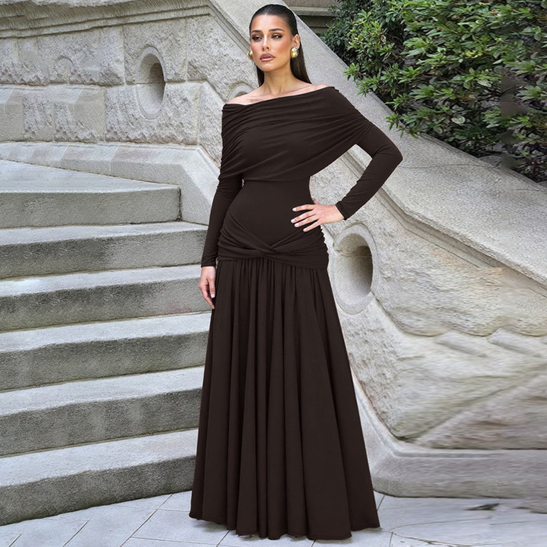 Dame wrap dress with voluminous ruffle hem and elegant off-shoulder design Mirla-Eva Jonsson