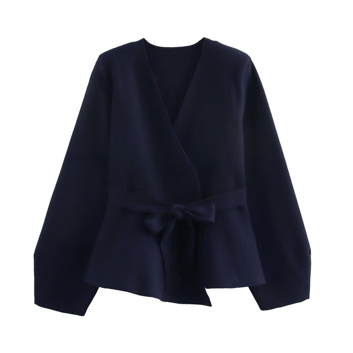 Dame wrap jacket with elegant waistline and arc motif Mirla-Eva Jonsson
