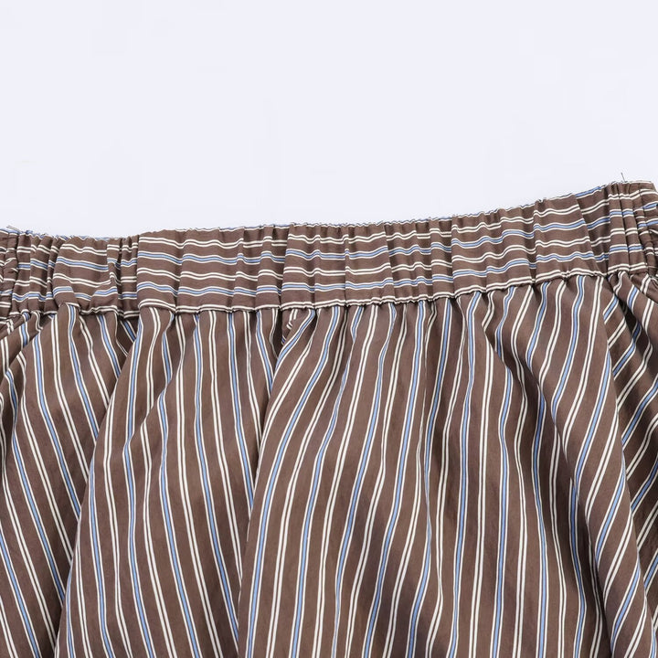 Dame wrap skirt with fashionable stripe pattern and practical tie belt detailing Mirla-Eva Jonsson