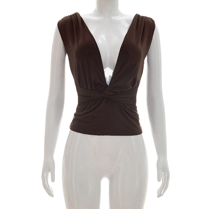 Dame wrap top med djup V-urringning och elegant knutdetalj Mirla-Eva Jonsson