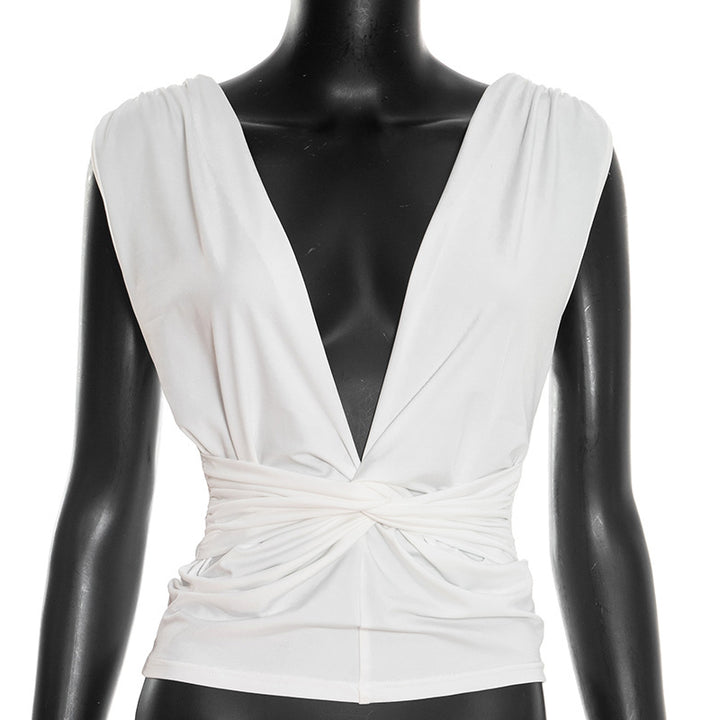 Dame wrap top med djup V-urringning och elegant knutdetalj Mirla-Eva Jonsson