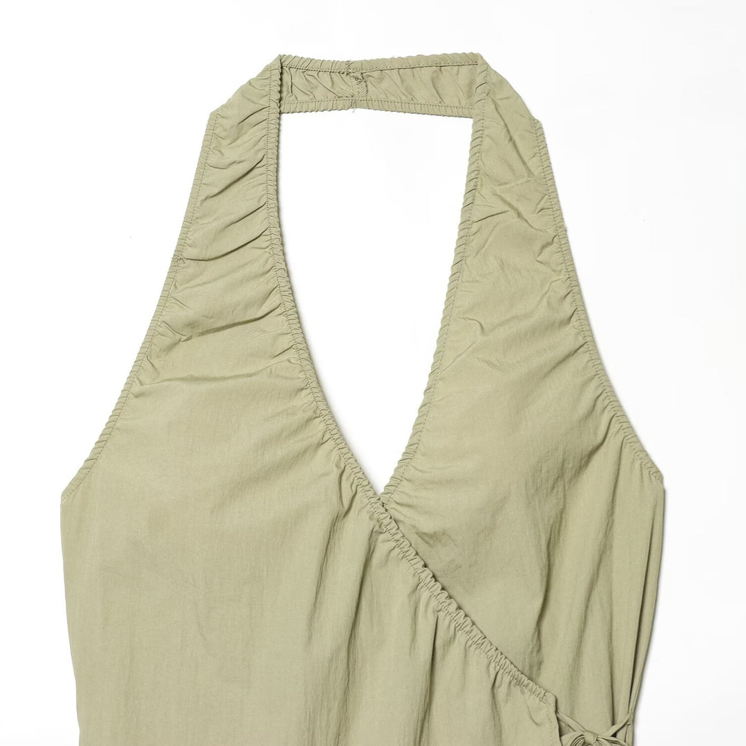 Dame wrap top med raffinerad halterneck och lös passform Mirla-Eva Jonsson
