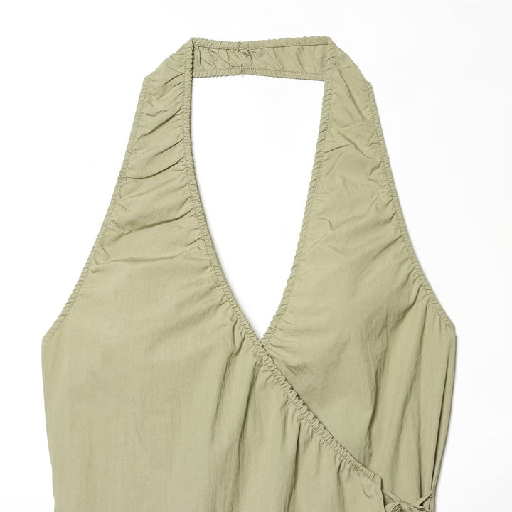 Dame wrap top med raffinerad halterneck och lös passform Mirla-Eva Jonsson