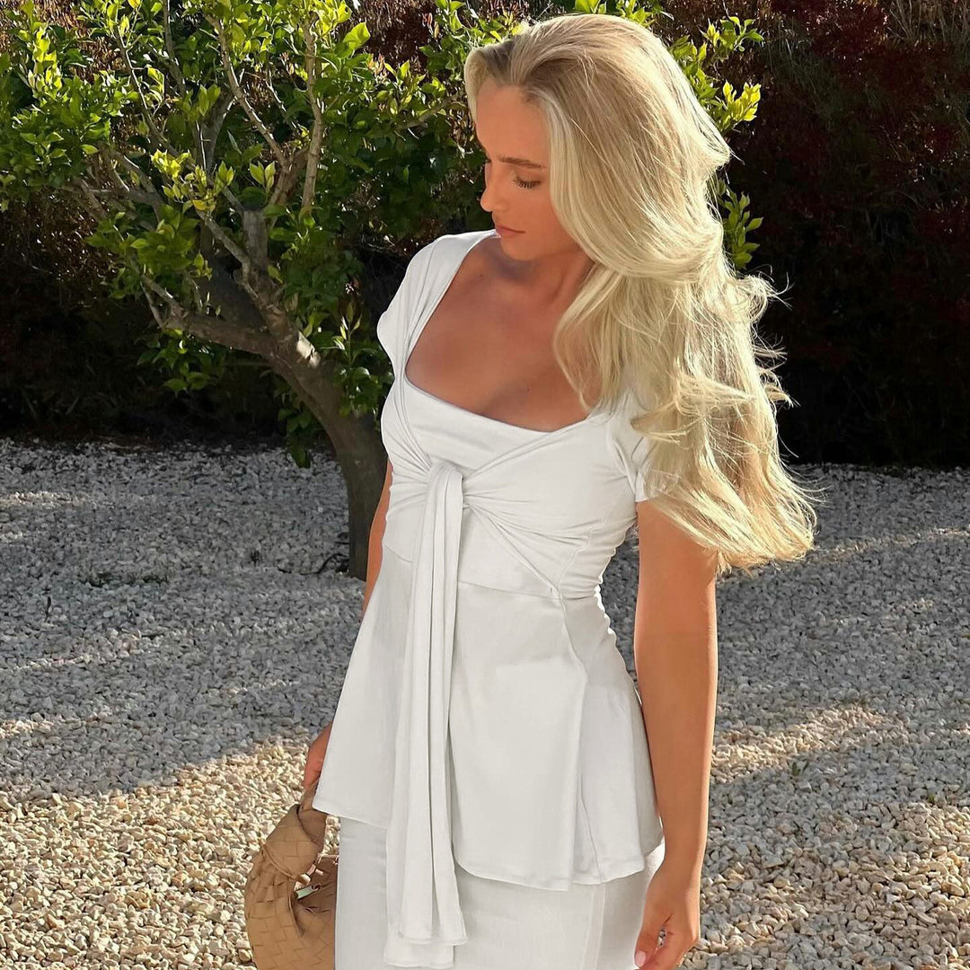 Dame wrap top med stor utskärning och flytande snitt Mirla-Eva Jonsson