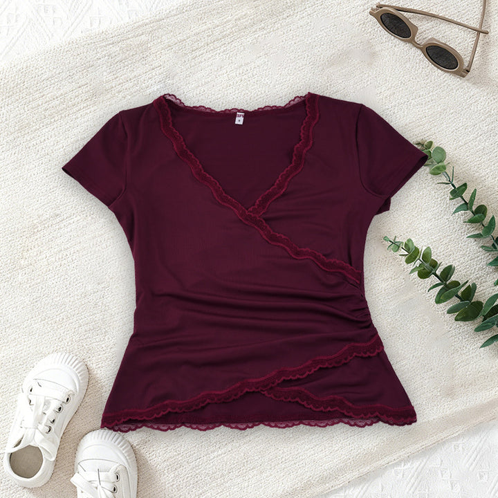 Dame wrap top with lace trim and ruffle details Mirla-Eva Jonsson