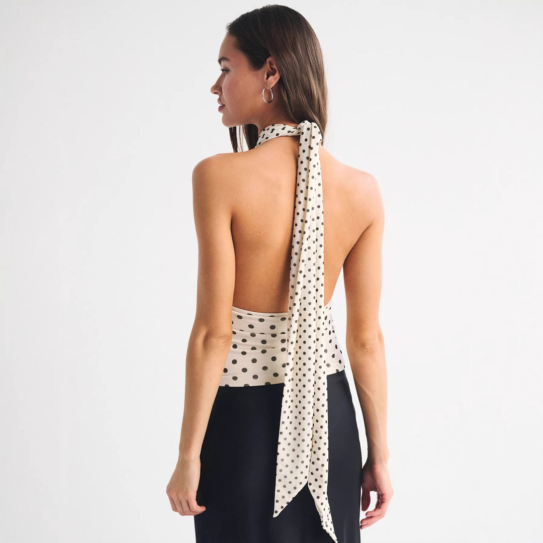 Dame wrap top with stylish polka dot design and deep neckline Mirla-Eva Jonsson