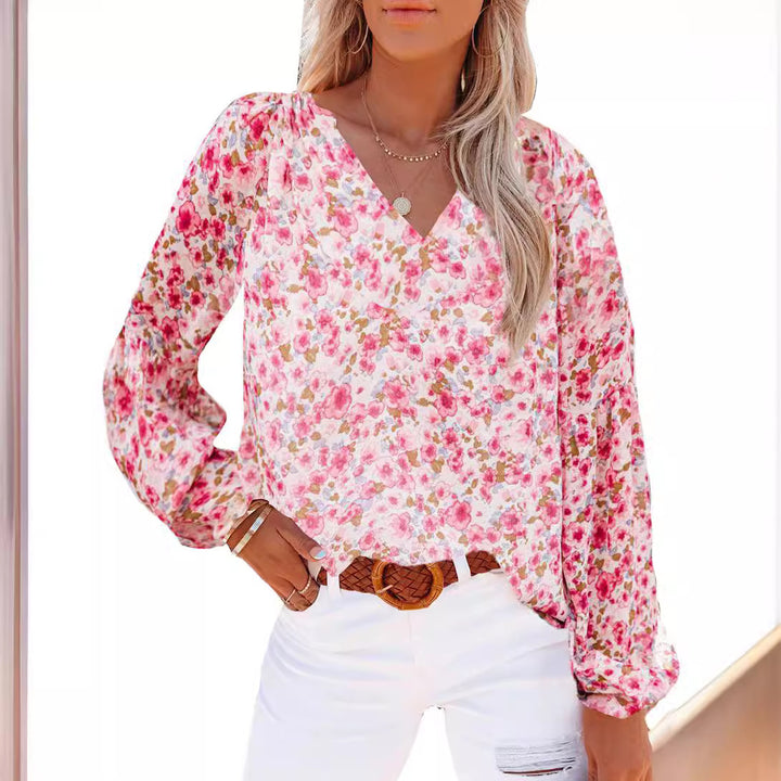 Dameblus med Florala Mönster och Luftiga Ärmar Mirla-Eva Jonsson