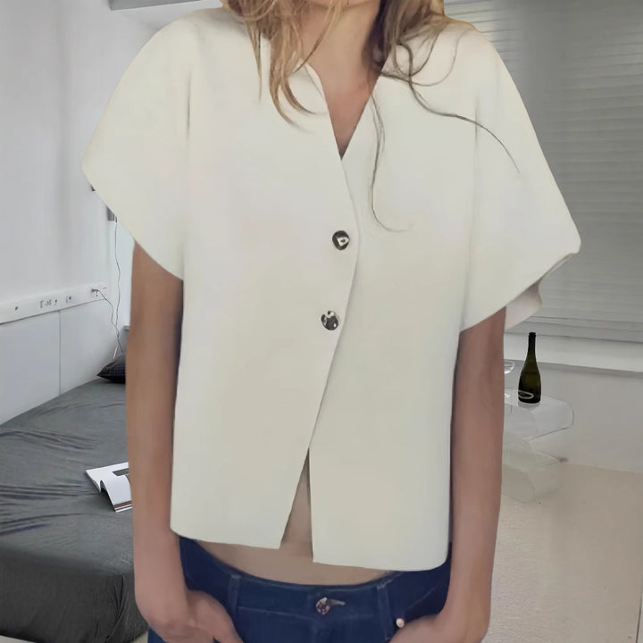 Dameblus med innovativ snitt och eleganta detaljer Mirla-Eva Jonsson