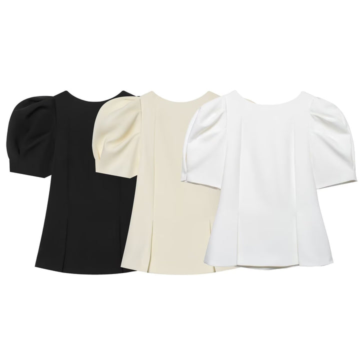 Dameblus med puffärmar och elegant snitt Mirla-Eva Jonsson