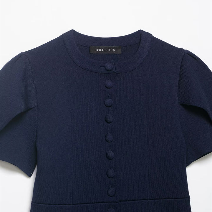 Dameblus med strukturerade puffärmar och knapppdetail Mirla-Eva Jonsson