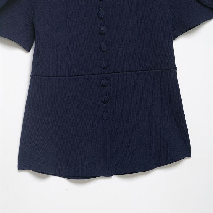 Dameblus med strukturerade puffärmar och knapppdetail Mirla-Eva Jonsson