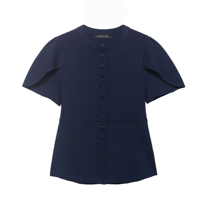 Dameblus med strukturerade puffärmar och knapppdetail Mirla-Eva Jonsson