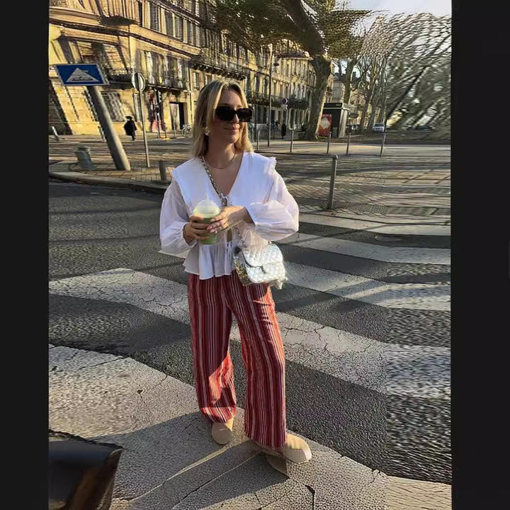 Dameblus med volangdetaljer och figursydd snitt Mirla-Eva Jonsson