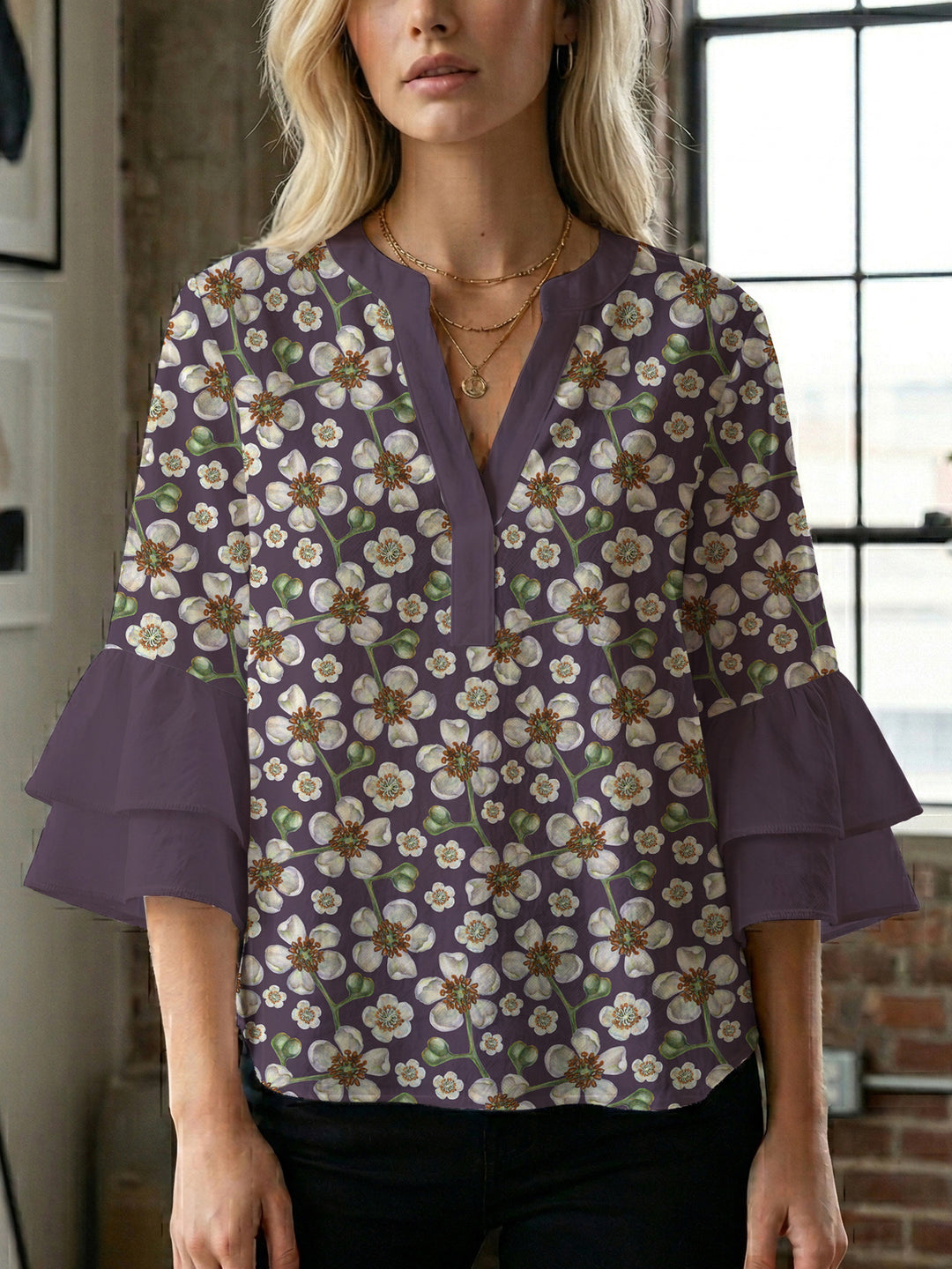 Dameblus med voluminösa ärmar och blommönster Mirla-Eva Jonsson