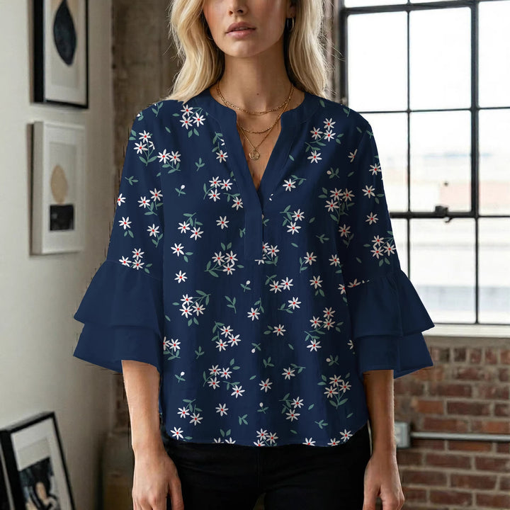 Dameblus med voluminösa ärmar och blommönster Mirla-Eva Jonsson