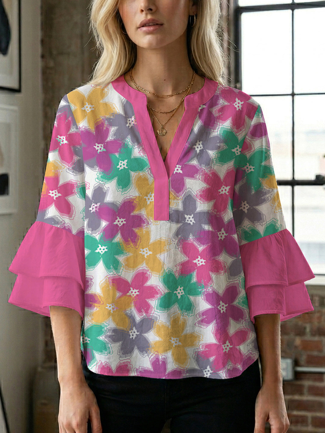 Dameblus med voluminösa ärmar och blommönster Mirla-Eva Jonsson