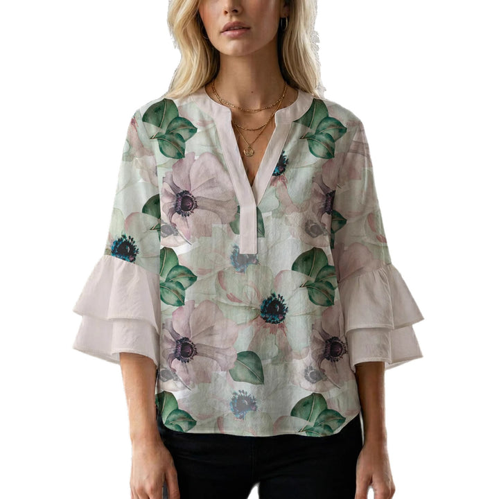 Dameblus med voluminösa ärmar och blommönster Mirla-Eva Jonsson