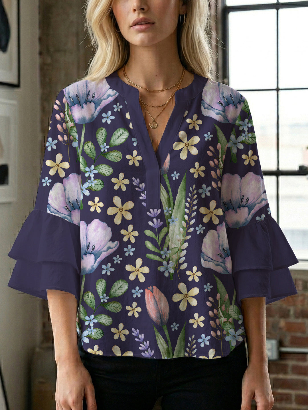 Dameblus med voluminösa ärmar och blommönster Mirla-Eva Jonsson