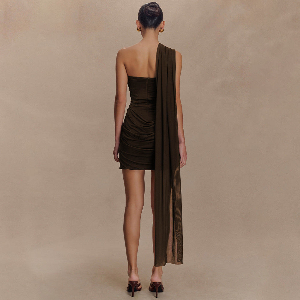 Damed cocktail dress with asymmetrical top and elegant draping design Mirla-Eva Jonsson