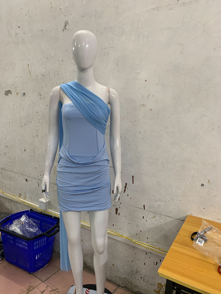 Damed cocktail dress with asymmetrical top and elegant draping design Mirla-Eva Jonsson