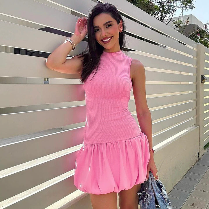 Dameklänning med ärmlös, figurnära överdel och voluminös kjol Eva Jonsson-Eva Jonsson