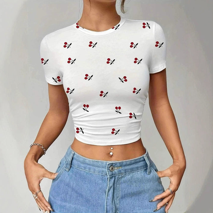 Damen Crop-T-Shirt med fräscht körsbärsmotiv och figurnära snitt Mirla-Eva Jonsson