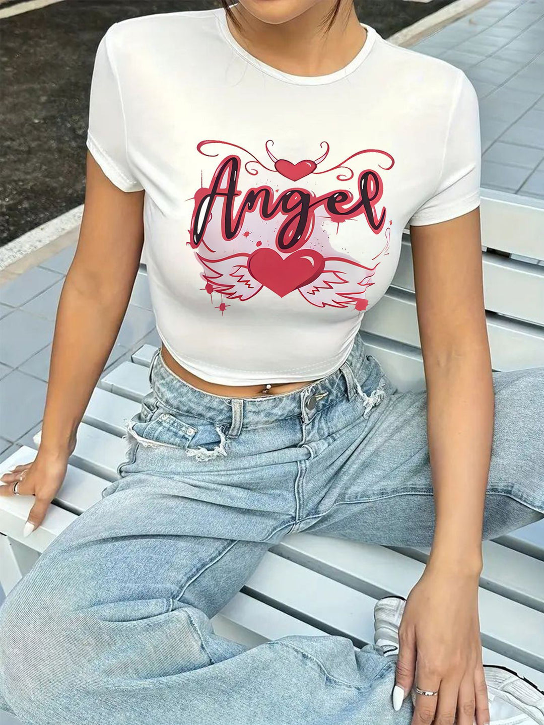 Damen Crop-T-Shirt med iögonfallande statement-tryck Mirla-Eva Jonsson